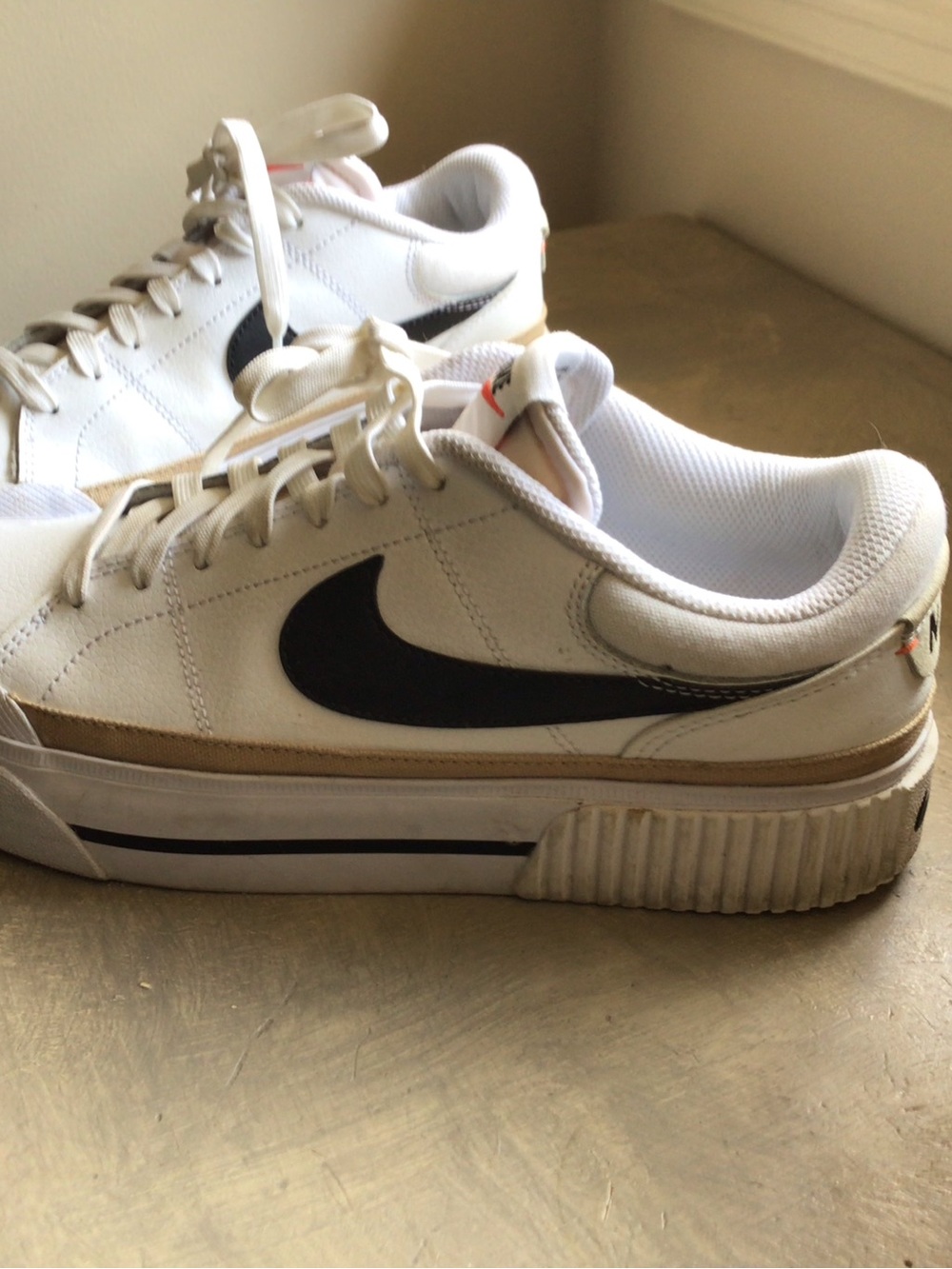 Nike Men’s White Sneakers with Black Swoosh and Tan Accent